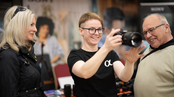 A Sony employee demonstrating a camera