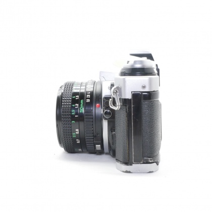 Used Canon AE-1 35mm SLR, silver with 50mm lens Used Canon AE-1 35mm SLR, silver with 50mm lens
